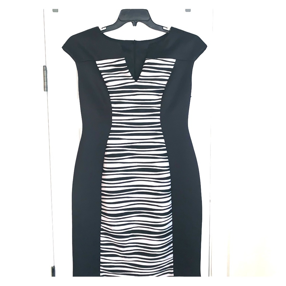 Black and light Pink striped hourglass dress.